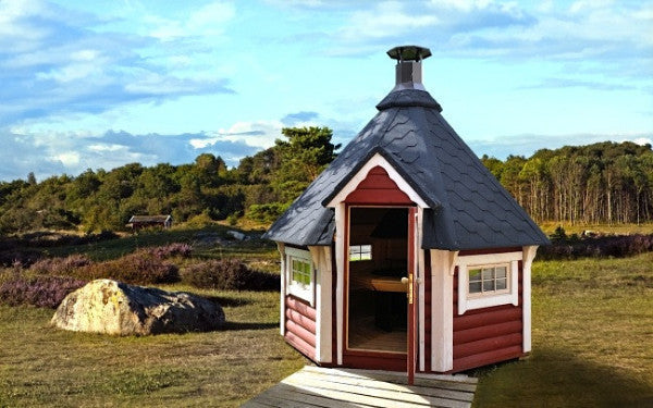 Small bbq hut placed close to the forest